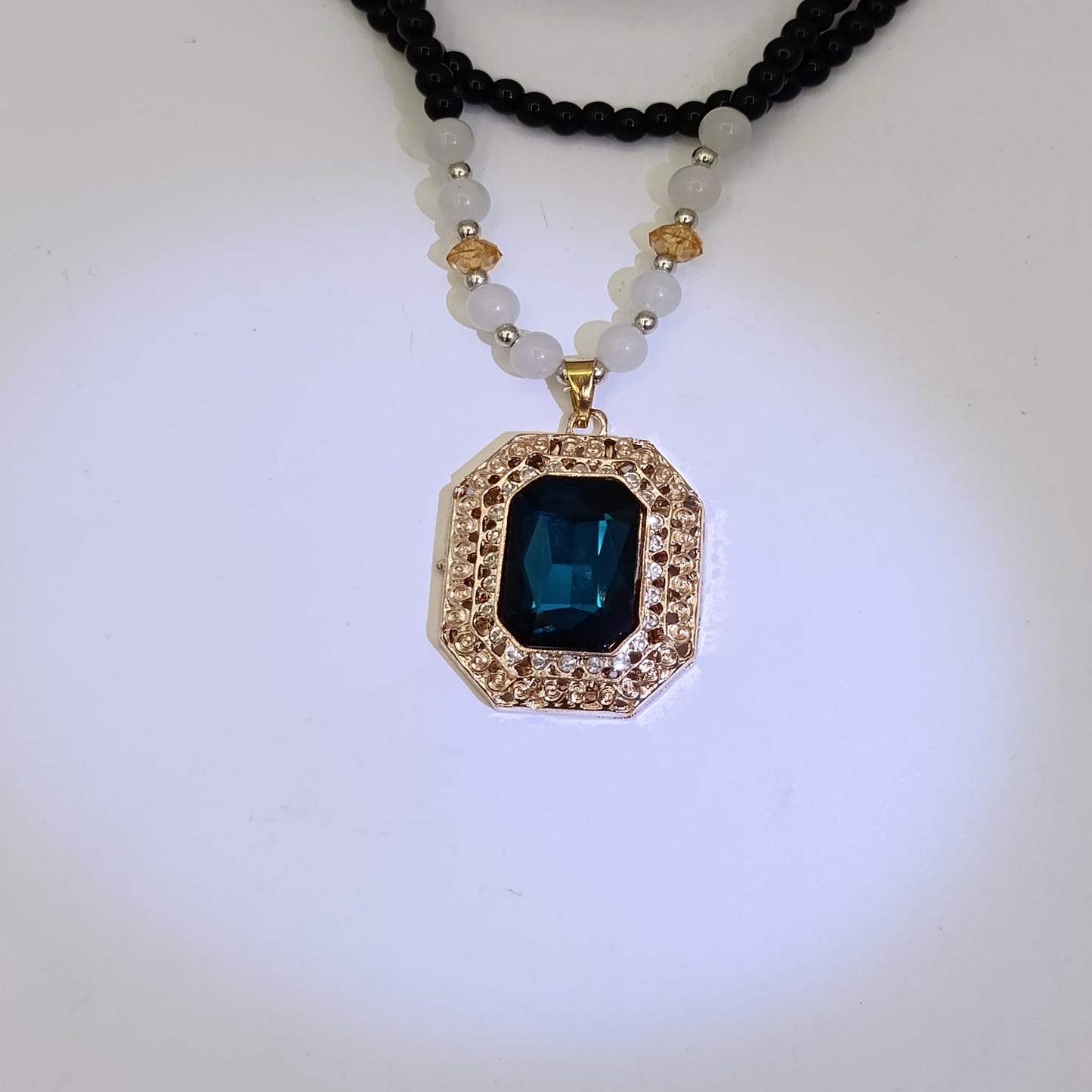 Imported Zircon Locket with Big Blue Stone